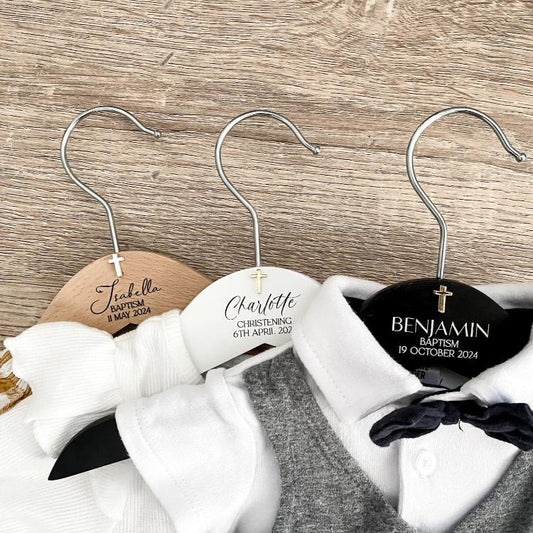 A personalised wooden coat hanger engraved with your chosen name, perfect for Christening, Baptism, or Name Day celebrations. Handmade with care in Australia, this keepsake hanger is ideal for presenting baptismal gowns, christening outfits, or special occasion clothing. A thoughtful gift for godparents, grandparents, or loved ones to cherish and remember the meaningful day.