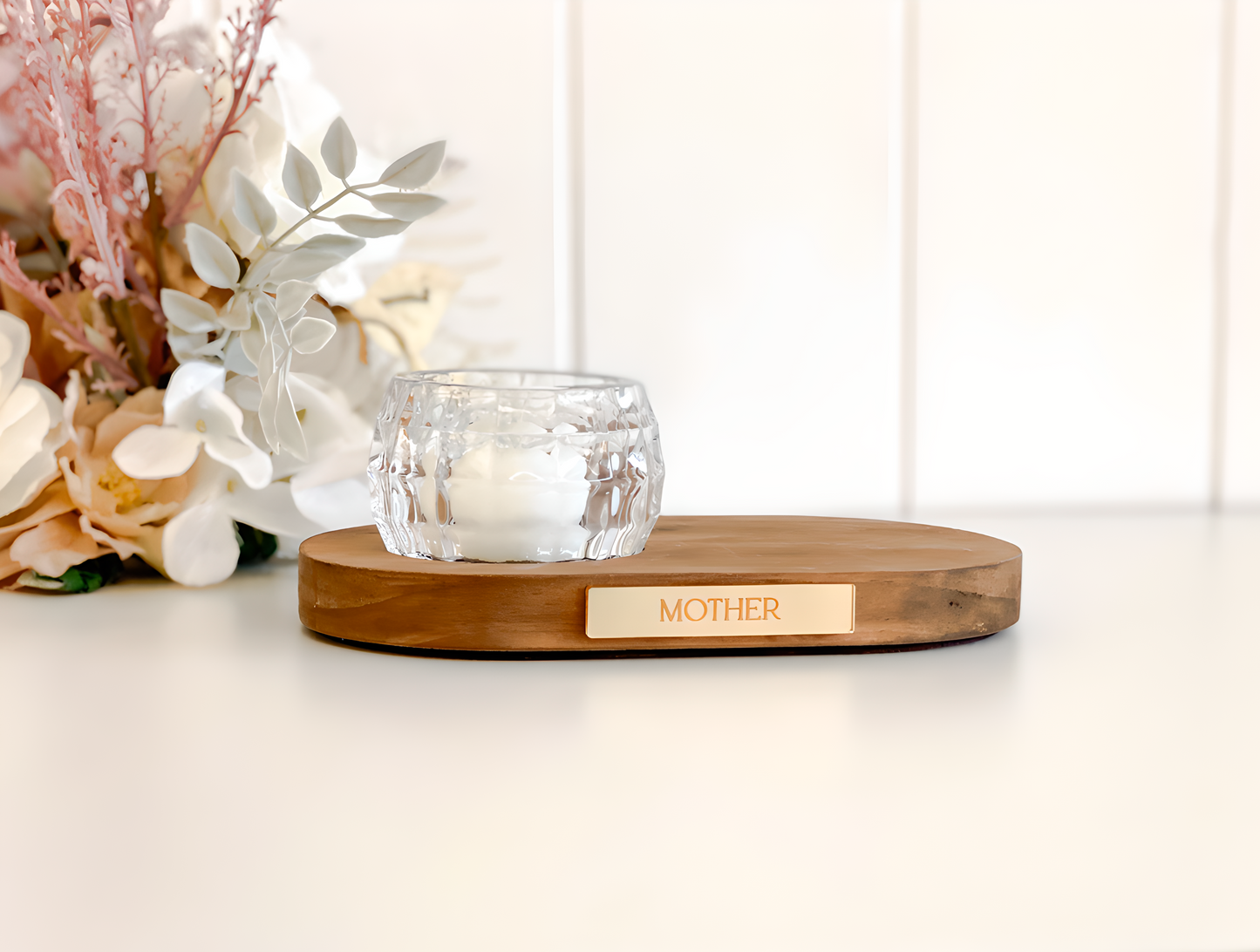 Elegant remembrance tealight candle holder with engraved wood base and glass tealight cup. Personalised plaque available in silver or gold with optional message on top. A thoughtful sympathy gift for grieving families, a keepsake for anniversaries, or tribute piece for home décor. This memorial candle holder provides warmth, comfort, and lasting memory.
