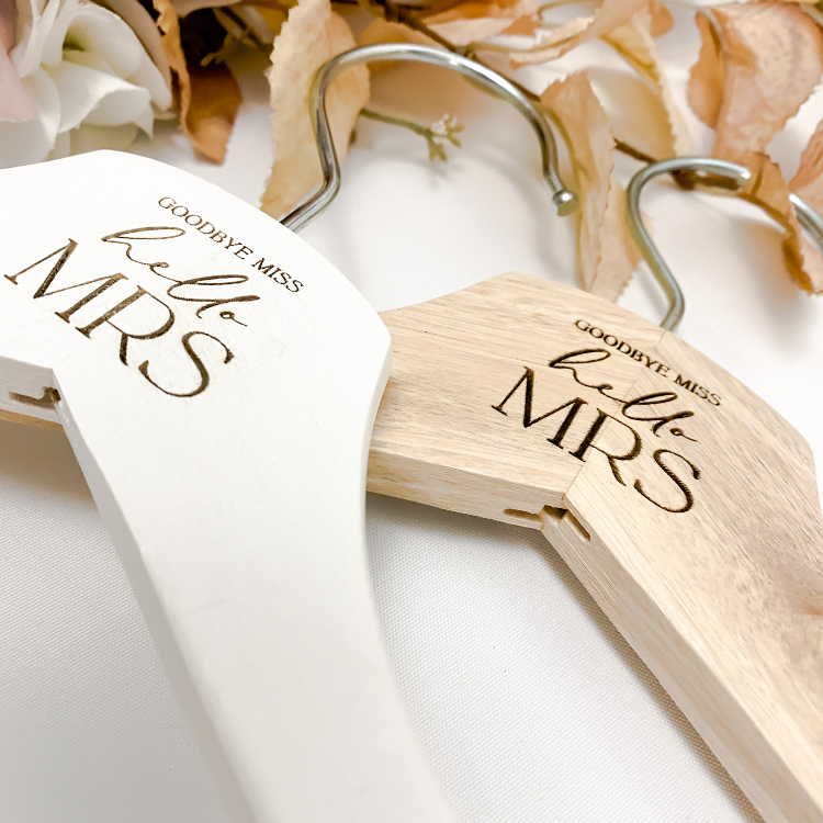 Personalised wedding coat hanger engraved with “Miss to Mrs” and your custom details. Crafted from premium wood, this elegant hanger is ideal for displaying bridal gowns, bridesmaid dresses, or special outfits on the big day. A thoughtful bridal shower gift, keepsake, or wedding favour, designed to capture memories and add charm to wedding photography. Handmade in Australia for brides and bridal parties.
