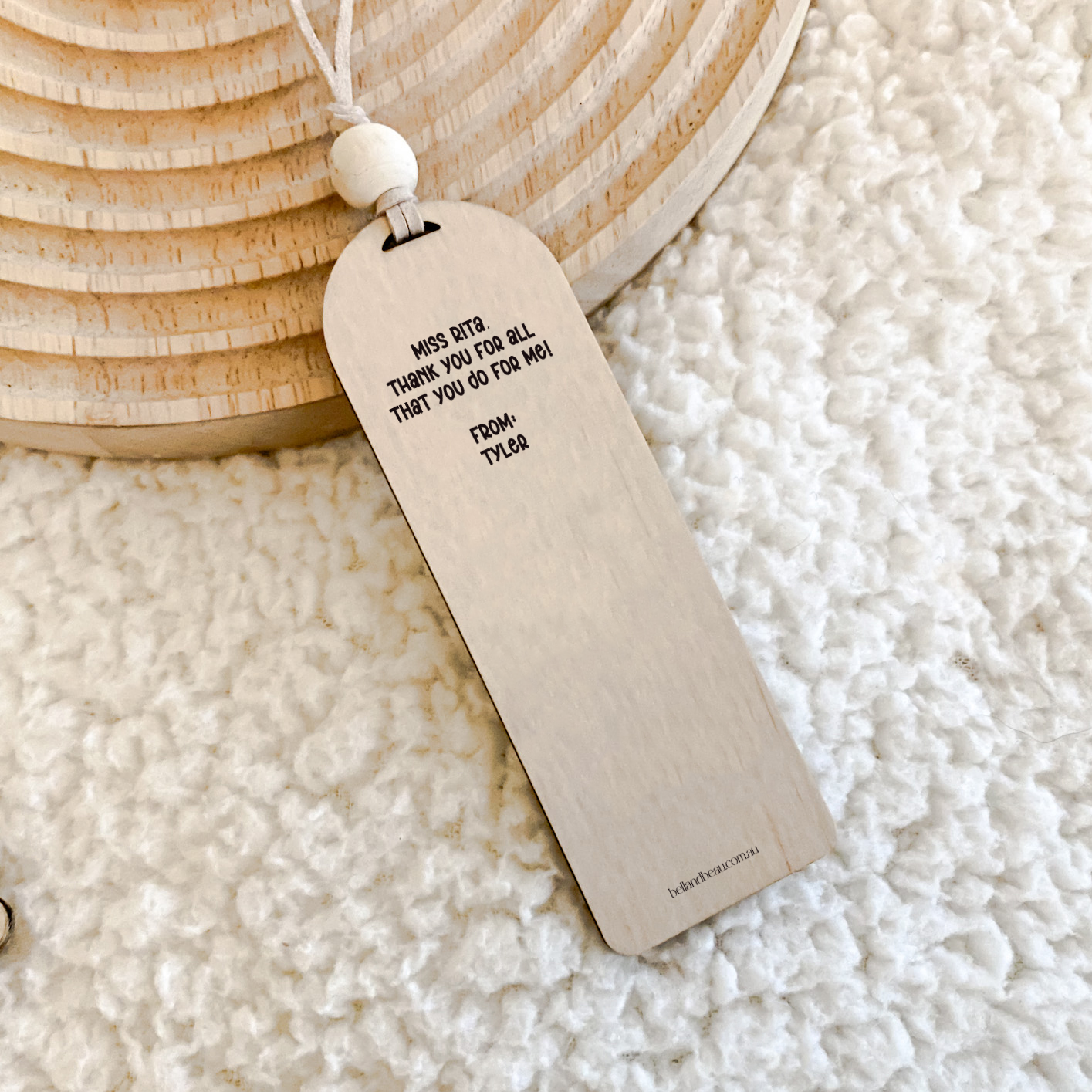 An adorable wooden bookmark, an ideal end-of-year gift for a teacher, featuring bees and a pun.