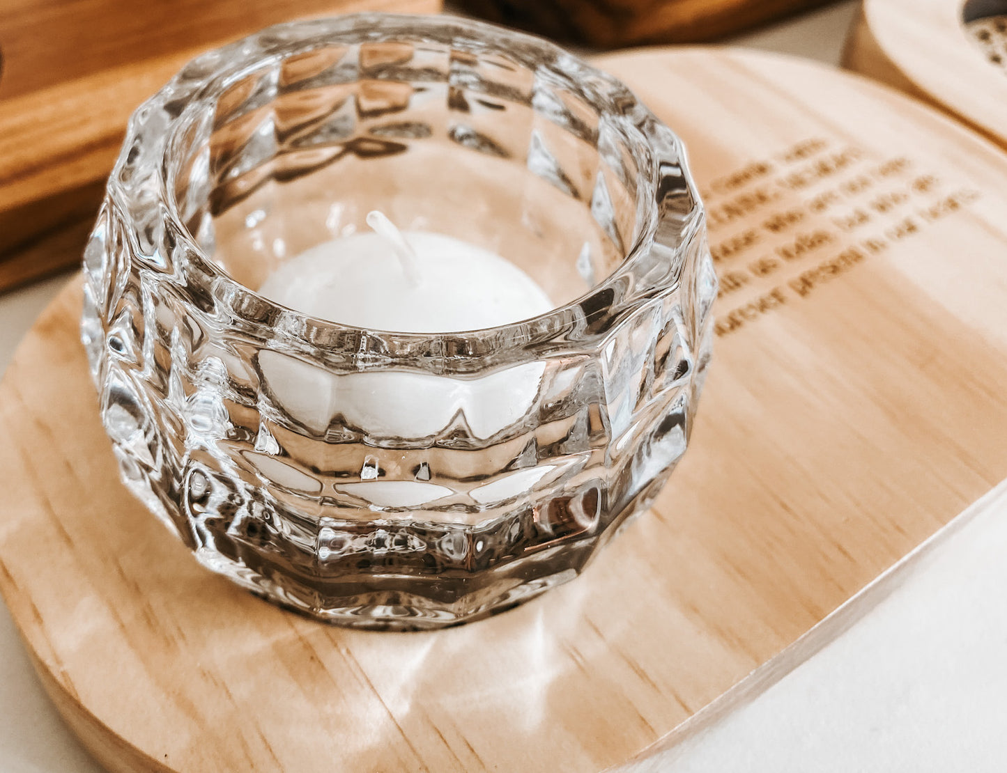 Personalised remembrance tealight holder made from smooth wood base with premium glass cup and engraved plaque. Available in natural or teak finish with silver or gold plaque. Includes one tealight candle and option for custom engraved message. A meaningful condolence or sympathy gift for funerals, memorials, or anniversaries, offering comfort and tribute.