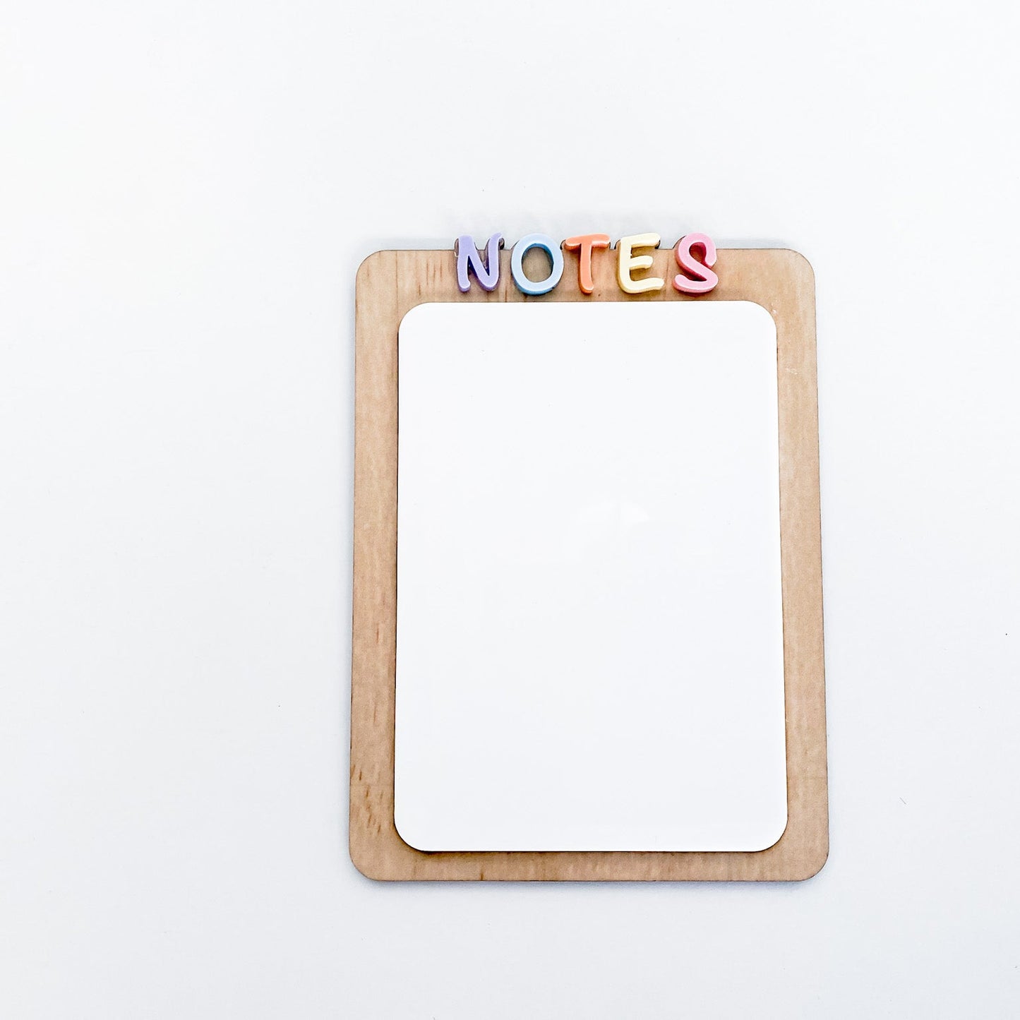 Cute desk accessory dry erase board with colourful, dimensional 'NOTES' letters