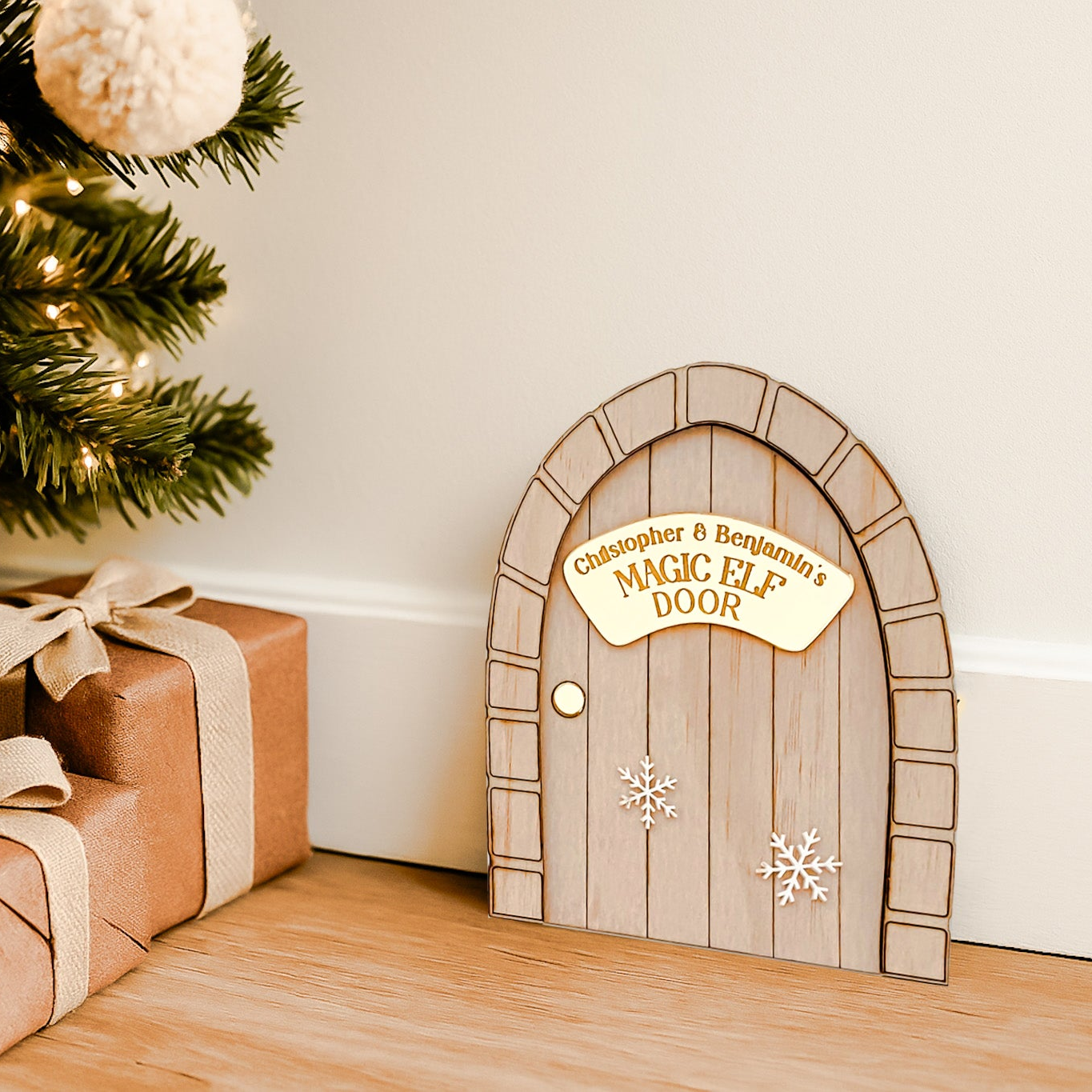 Festive Magic Elf Door made from wood with an engraved gold plaque and snowflake details. The perfect Christmas tradition for families, encouraging imagination and joy. Optional personalisation adds a unique touch for children’s holiday memories.