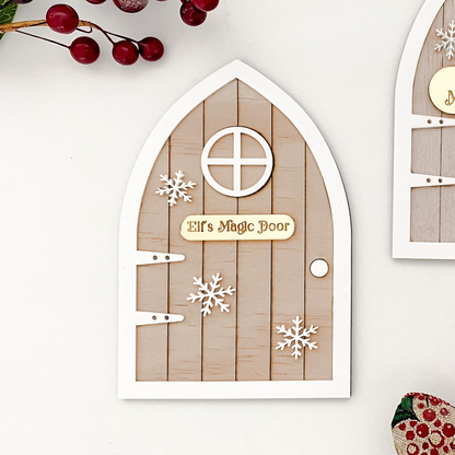 Handcrafted personalised Magic Elf Door made from wood and acrylic, featuring a gold nameplate, 3D snowflake accents, and arched brick detailing. A beautiful Christmas decoration designed to welcome Santa’s little helper into your home. Perfect for family traditions, children’s imagination, and festive storytelling throughout December.