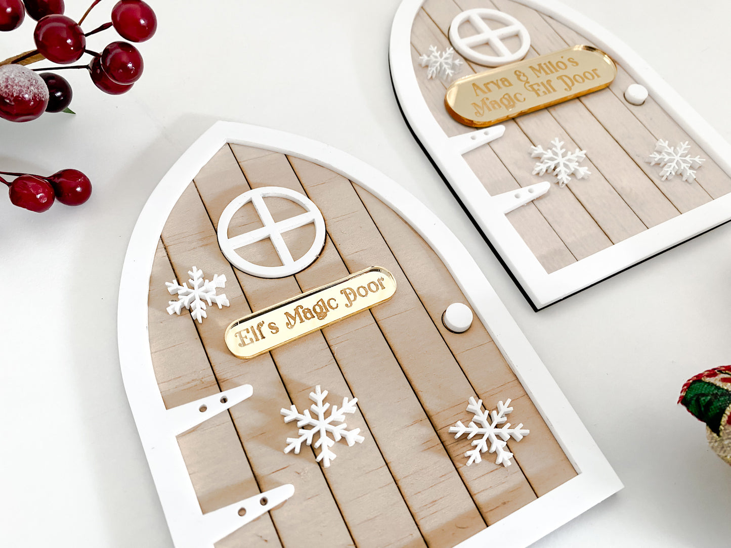 Handcrafted personalised Magic Elf Door with 3D acrylic snowflakes and gold plaque, made in Australia by Bell & Beau Design Co. A whimsical Christmas decoration designed to inspire festive imagination in children during December.