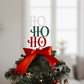 Modern Ho Ho Ho Acrylic Christmas Tree Topper handmade by Bell & Beau Design Co, featuring layered red, green and white acrylic letters with a silver star accent and red satin ribbon. A festive, lightweight holiday decoration made in Australia, ideal for small and standard trees.