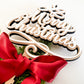 Elegant Christmas star tree topper alternative with layered white acrylic and wooden lettering that reads “Merry Christmas.” Styled with green pine sprigs and a luxurious red ribbon bow, this Christmas tree decor combines rustic charm with modern design. A meaningful family tradition piece and Christmas keepsake, sustainably handmade in Australia by Bell & Beau Design Co.
