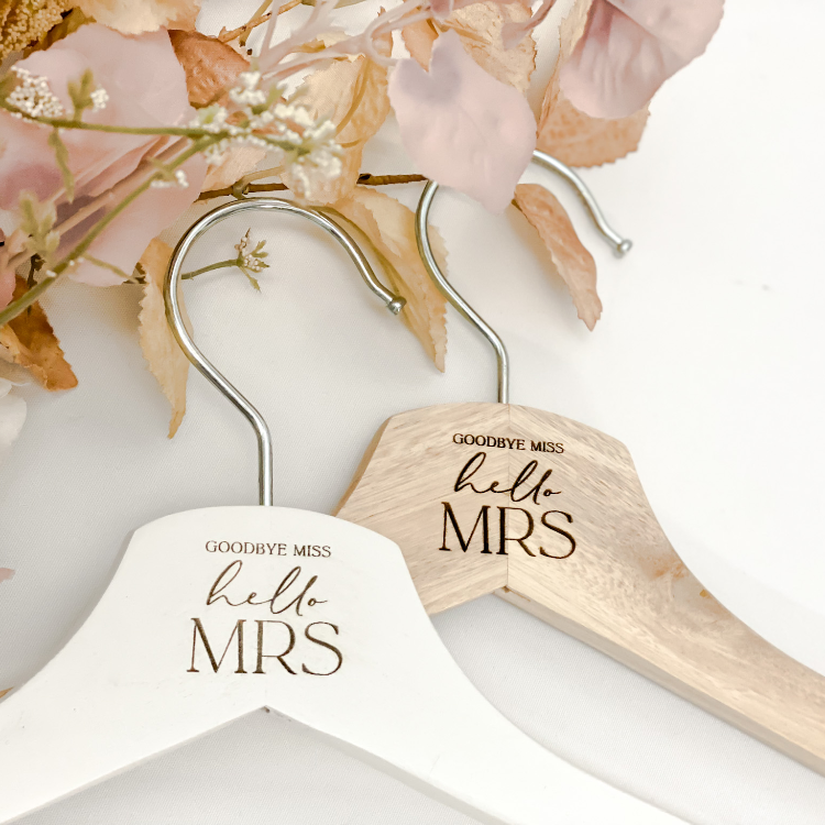 Elegant personalised wooden coat hanger engraved with “Miss to Mrs” and custom details, designed for brides, bridesmaids, and wedding parties. A thoughtful wedding gift and keepsake, perfect for displaying bridal gowns or special dresses. Ideal as a bridal shower present, wedding favour, or personalised accessory, crafted in Australia with quality materials for a timeless finish.