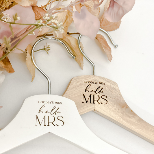 Elegant personalised wooden coat hanger engraved with “Miss to Mrs” and custom details, designed for brides, bridesmaids, and wedding parties. A thoughtful wedding gift and keepsake, perfect for displaying bridal gowns or special dresses. Ideal as a bridal shower present, wedding favour, or personalised accessory, crafted in Australia with quality materials for a timeless finish.