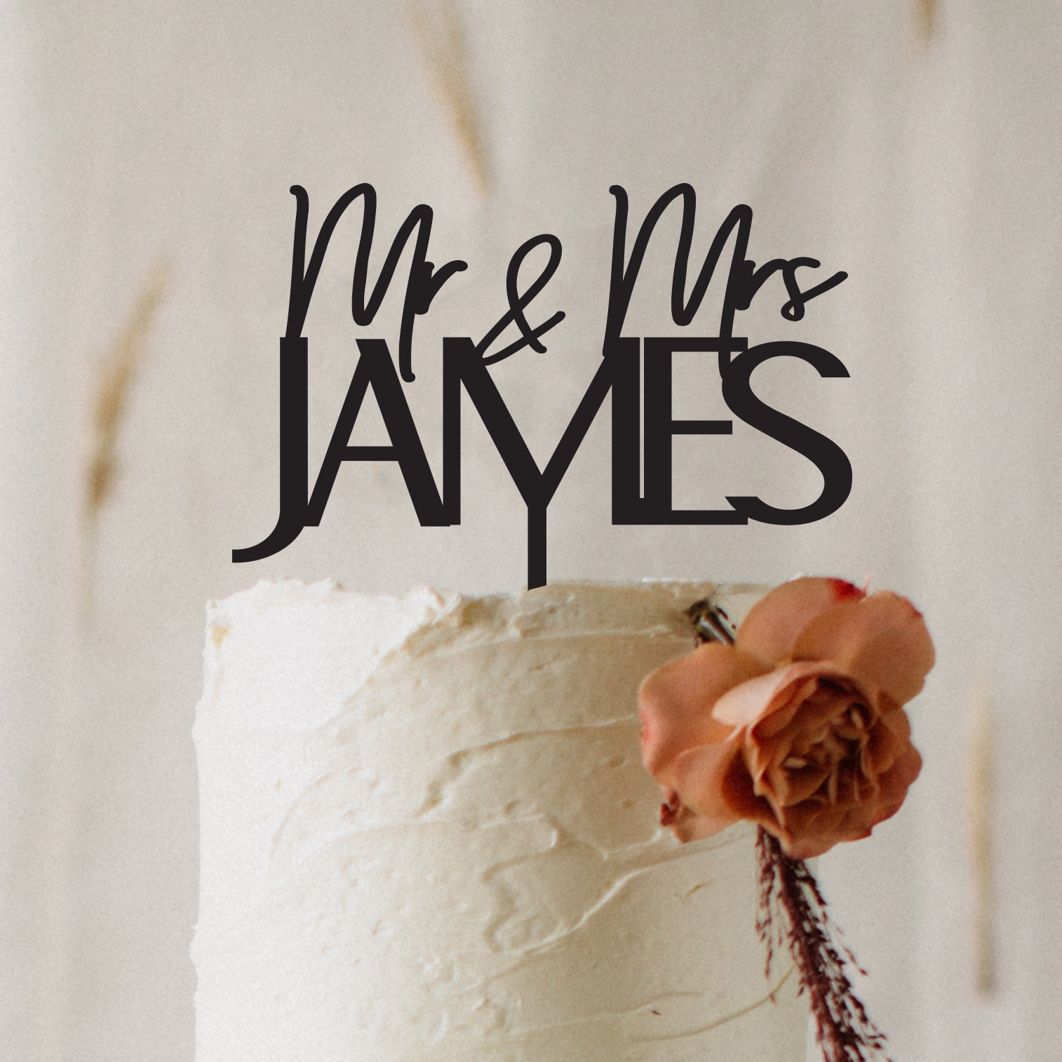 Personalised Mr & Mrs acrylic wedding cake topper displayed on a tiered wedding cake, custom-made in Australia with elegant lettering. Perfect for couples wanting a timeless and modern touch to their celebration. Ideal for weddings, anniversaries, and engagements, this lightweight yet durable topper serves as a keepsake décor piece long after the event, enhancing cake styling with a romantic finish. Created by Bell & Beau Design Co in the South Burnett Region, QLD, Australia.