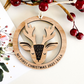 Beautiful wooden reindeer Christmas ornament designed as an eco-friendly Christmas bauble and personalised gift for the festive season. This custom ornament features a reindeer silhouette inside a circular frame, perfect for hanging on your Christmas tree as a tree ornament or Christmas tag. A charming keepsake for My First Christmas, Christmas name display, or thoughtful gift for Christmas—handcrafted in natural wood and available in four colours.