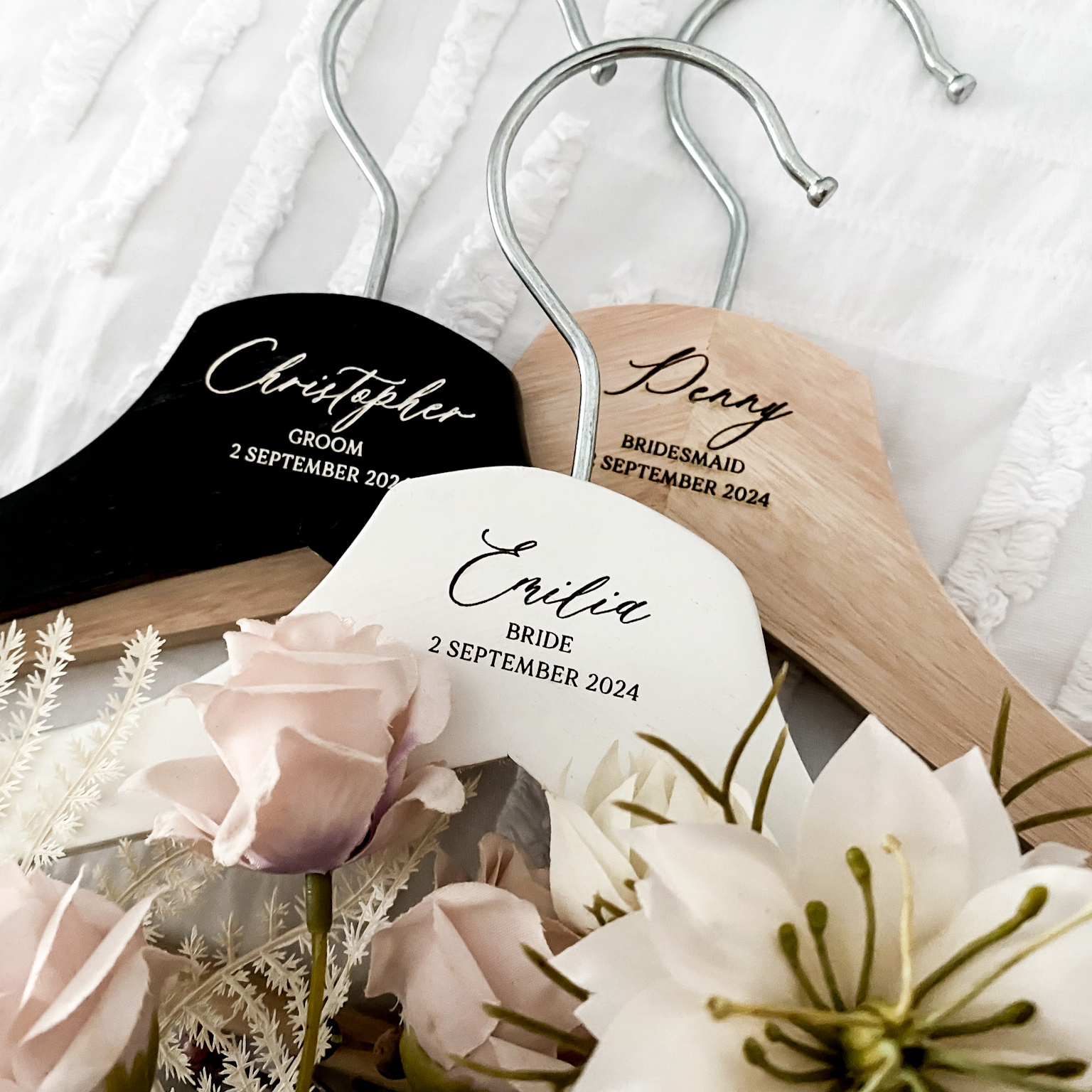 Elegant personalised wooden coat hanger engraved with custom names and dates, perfect as a keepsake for weddings, brides, bridesmaids, grooms, or wedding favours. Crafted from durable wood with a smooth finish, this hanger makes a thoughtful personalised gift for bridal parties or special events. Ideal for displaying dresses, gowns, or suits on your wedding day while creating a treasured memento.