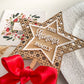 Custom rattan star tree topper with rustic wooden design, red ribbon bow, FSC plywood, eco friendly and sustainable Christmas décor.