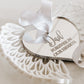 White angel wings with silver heart centre.  Hanging ornament complete with white sating ribbon. Perfect sympathy or remembrance gift. 