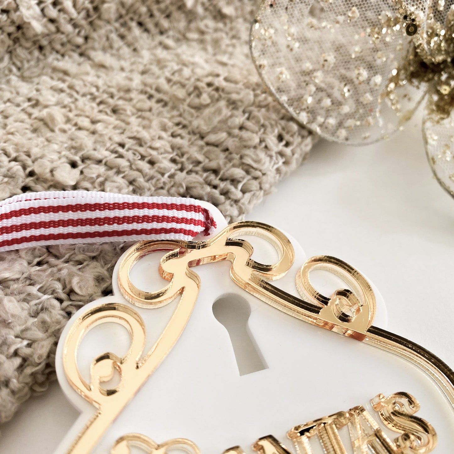 Close-up of Santa’s Magic Key door hanger with layered 3D lettering, keyhole design, and red ribbon, handmade Australian Christmas decoration.