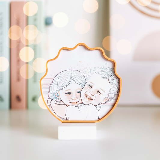 Unique scollop shape photo frame with line art image of two children