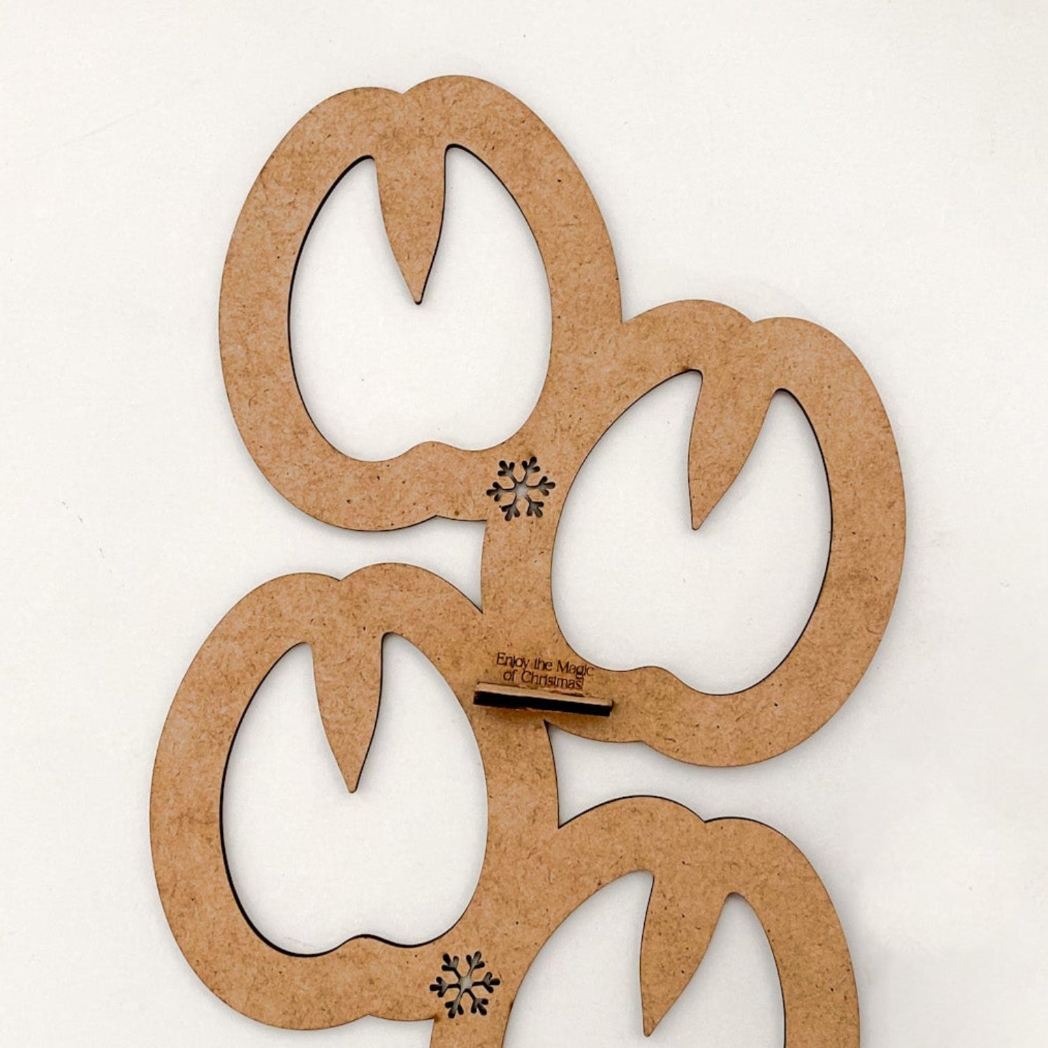 The Reindeer Boot Stencil viewed from an angle, emphasizing the clean, laser-cut edges of the wooden material.