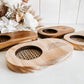 Handcrafted memorial tealight candle holder featuring natural or teak wood base, premium glass tealight holder, and choice of silver or gold plaque. Includes candle, with optional engraved personalisation. A meaningful sympathy or tribute gift, perfect for funerals, anniversaries, or everyday remembrance. Designed as comforting décor to keep memories alive.