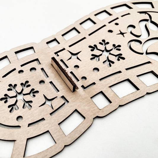 The Santa's Boot Stencil lying flat, showcasing the entire silhouette and pattern of the boot sole