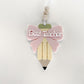 Single layered acrylic teacher appreciation ornament with a pink bow and the words Best Teacher