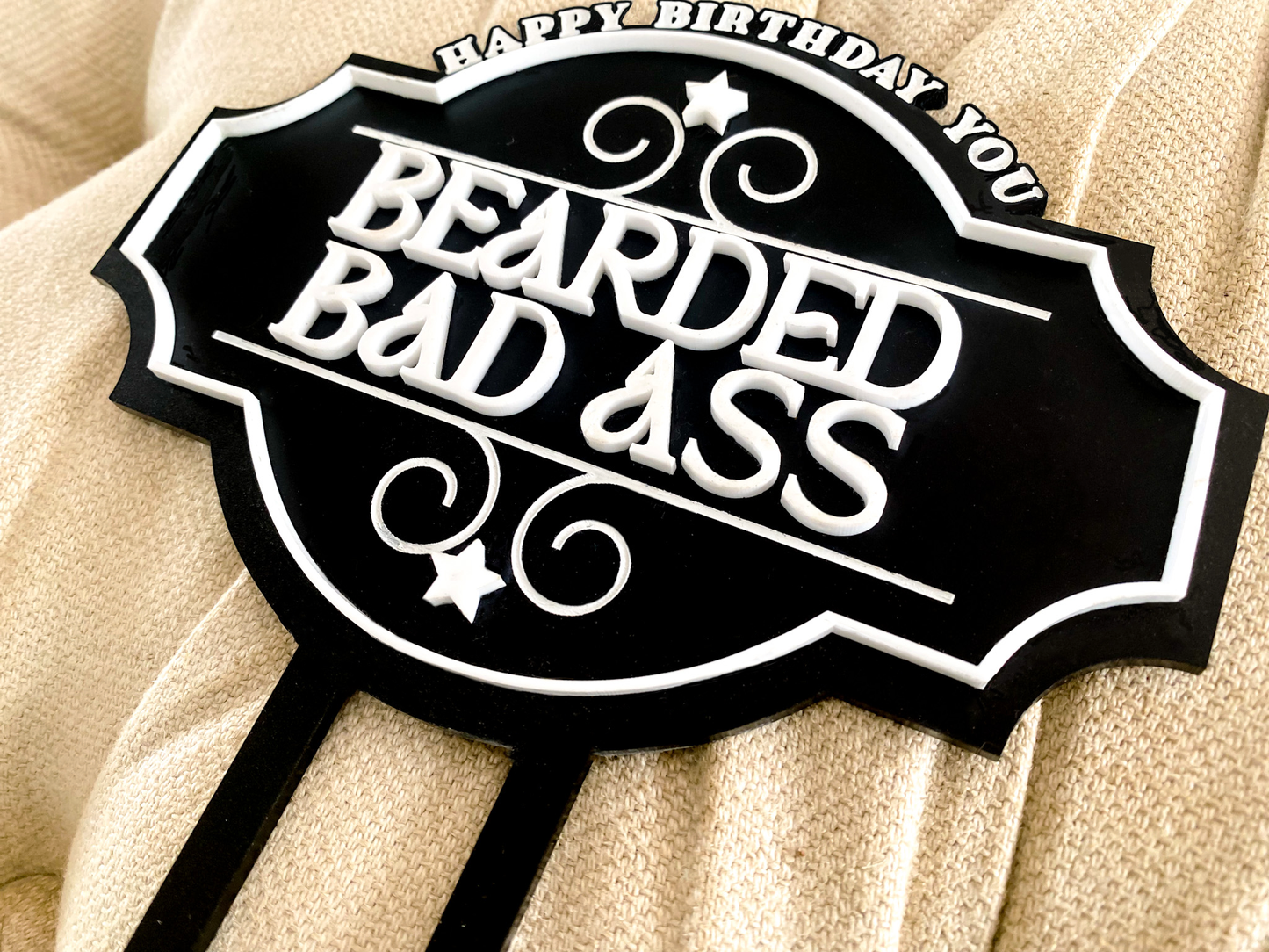Retro Bearded Badass Cake Topper showcased at a celebration, bringing humour and character to cakes. This fun, novelty design is crafted from premium acrylic, available in various finishes and colours, making it ideal for buck’s parties, milestone birthdays, or themed events. Lightweight and reusable, custom-designed in Australia, it transforms ordinary cakes into conversation starters at any celebration.