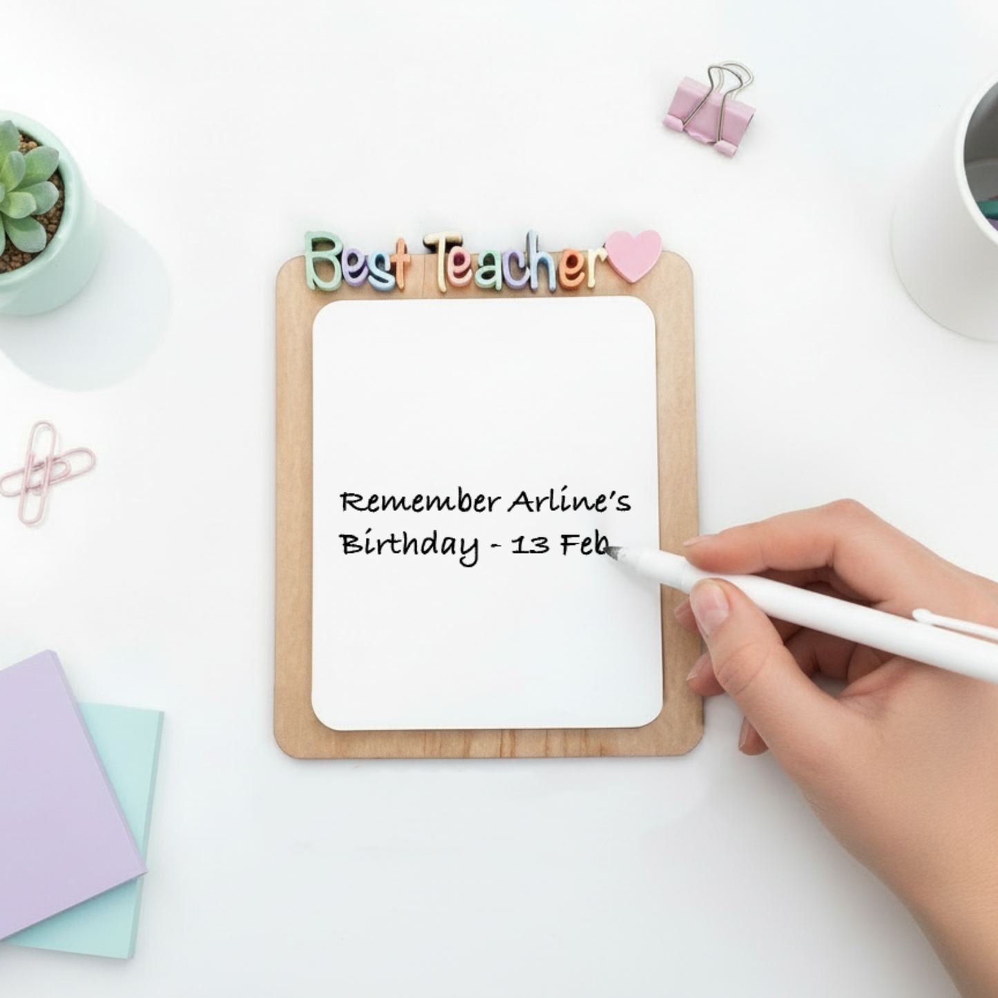 Teacher appreciation dry erase desk notepad with a wooden back and acrylic front, featuring colourful Best Teacher letters.