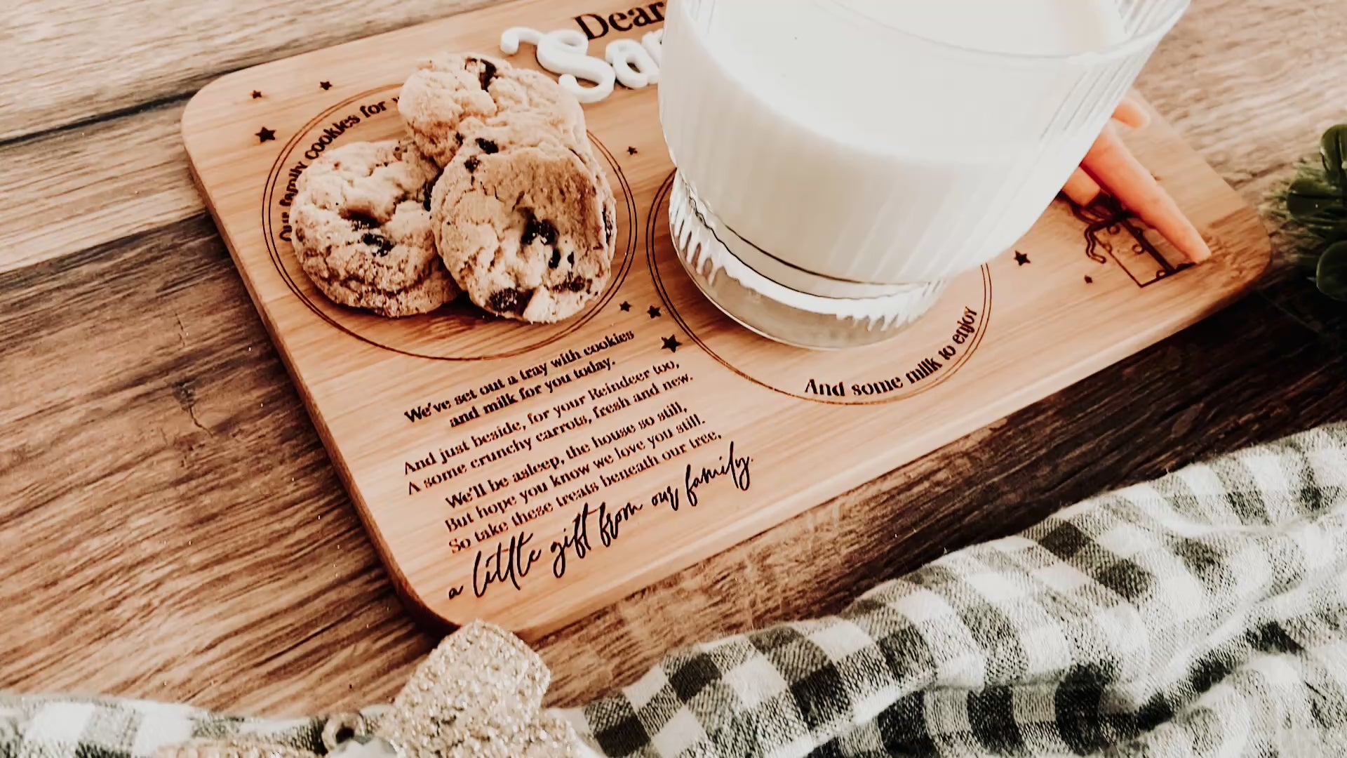 Rustic Christmas styling with checkered fabric bow and festive berries beside wooden Santa tray. Warm neutral tones and natural texture highlight the handcrafted quality and nostalgic charm of this family-favourite Christmas Eve tradition board.