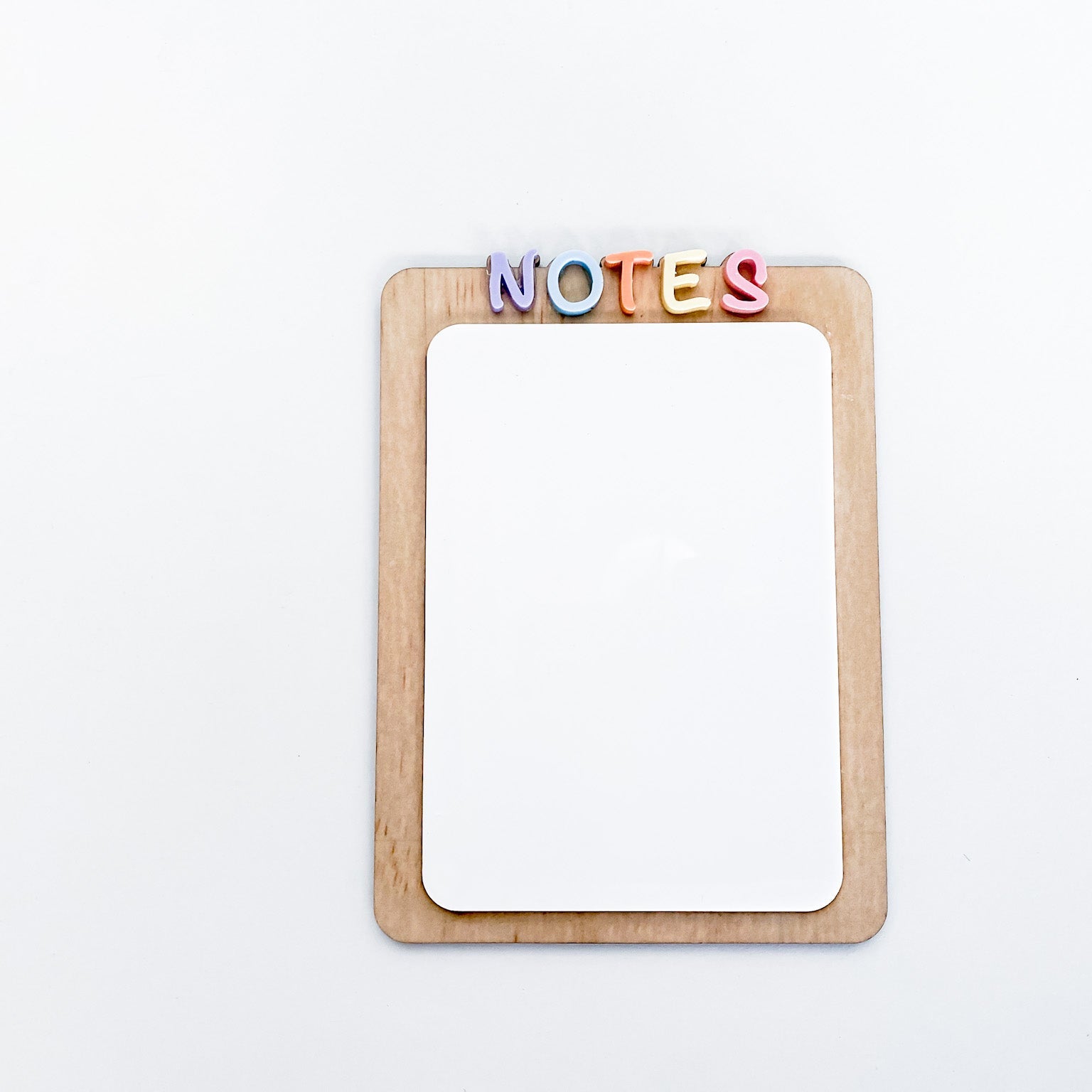 Cute desk accessory dry erase board with colourful, dimensional 'NOTES' letters