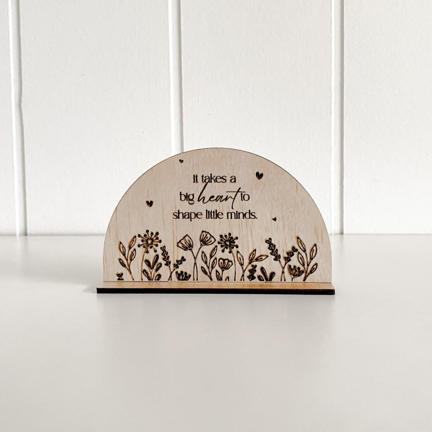 A sentimental wooden plaque for teachers with a floral design, perfect for end-of-year gifting in Australia.