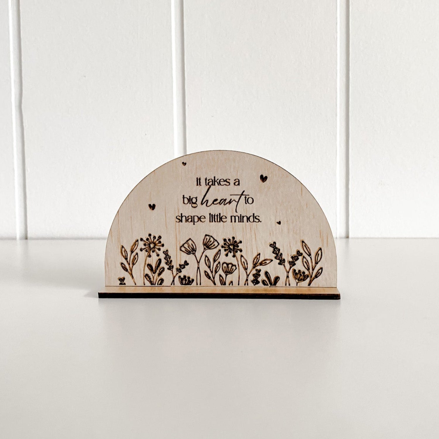 A sentimental wooden plaque for teachers with a floral design, perfect for end-of-year gifting in Australia.