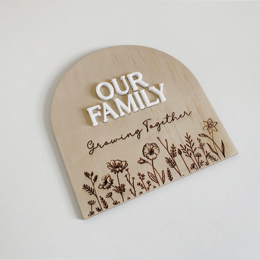 Wooden growth chart for families and renter friendly.